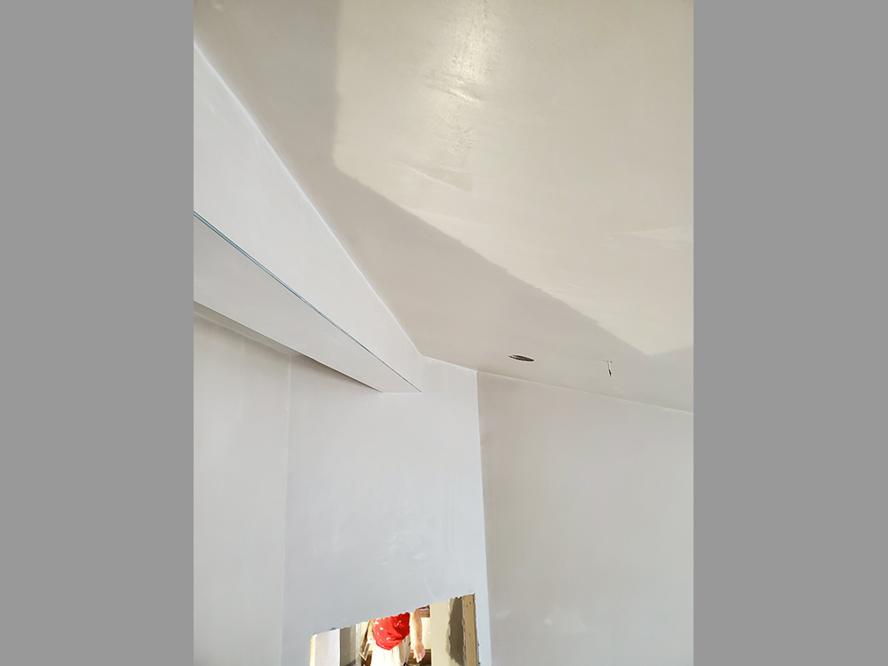 Smooth Plaster Finish on Vaulted Ceiling